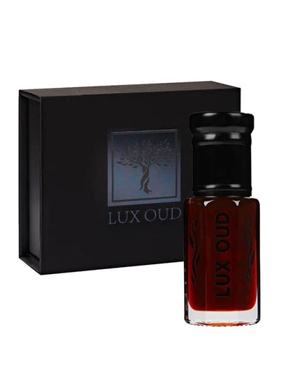 Lux Oud Trat Oud oil bottle showing rich amber-colored oud oil in a sleek glass container.