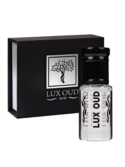 Lux Oud White Musk Oud oil in a clear glass bottle with a white cap, showcasing elegant packaging and soft lighting.